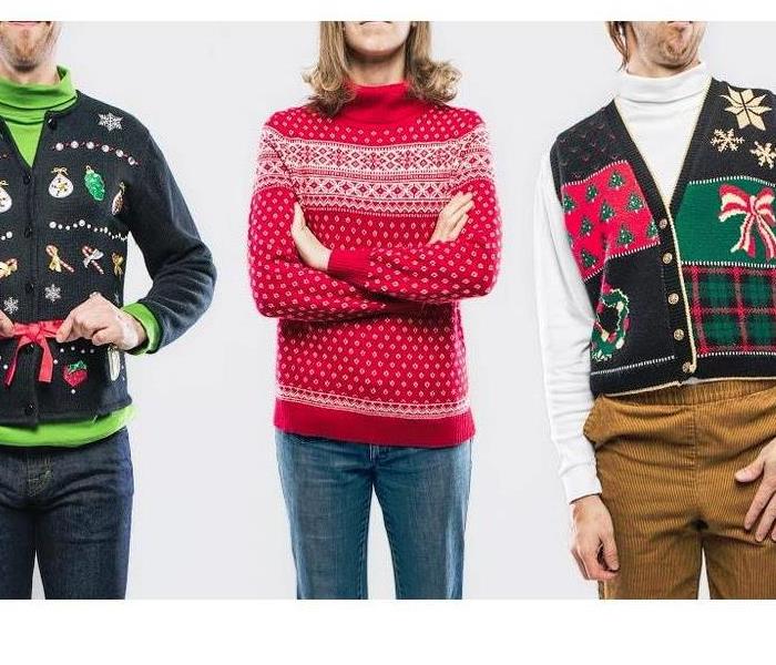 people lined up wearing winter sweaters